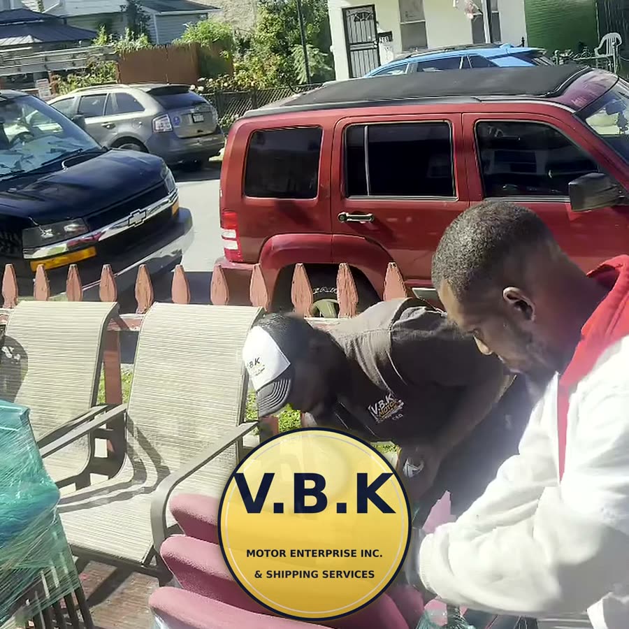 V.B.K Motor Enterprise Inc. & Shipping Services team wrapping and stacking customer chairs at a doorstep pickup